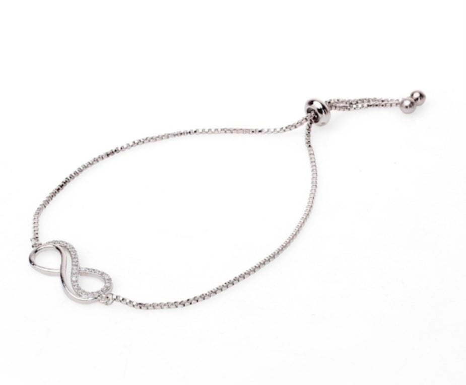 Infinity Knot Tassle Bracelet In Silver Plated Finish